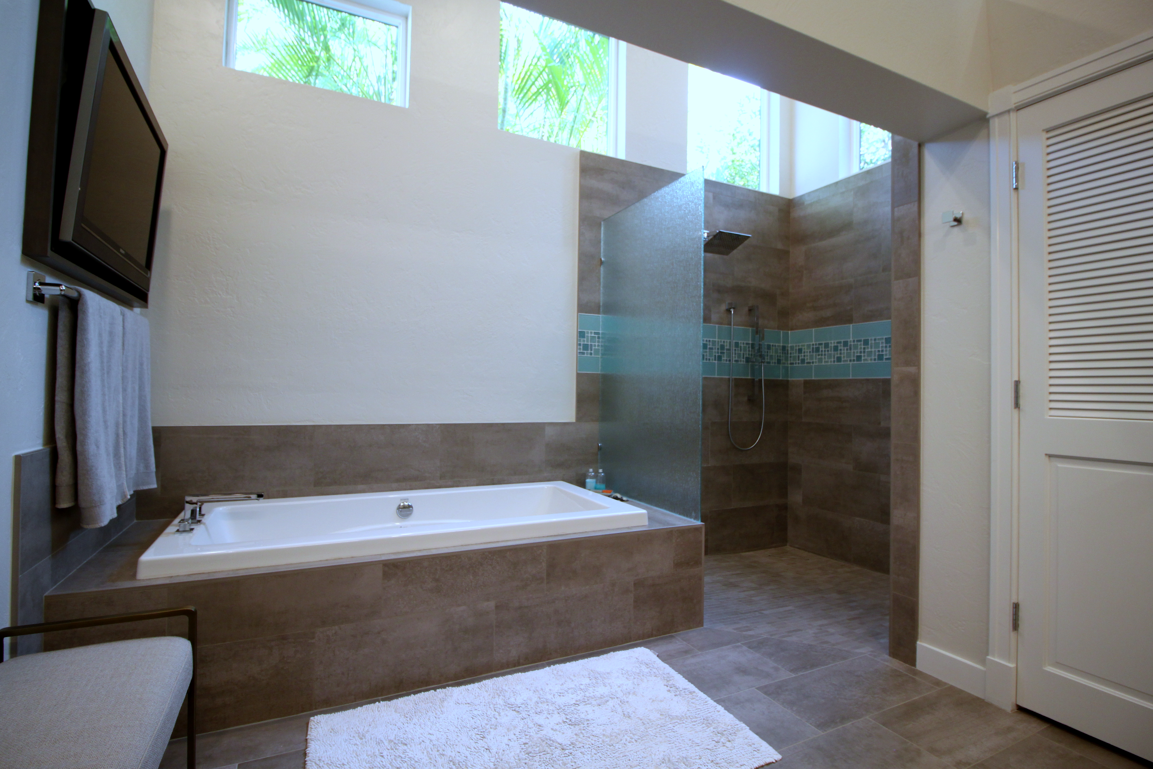 Gray cabinets and blue backsplash