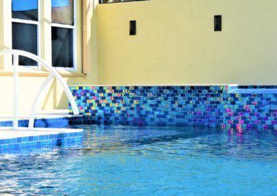 Shiny blue and purple tile pool