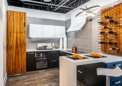 Kitchen with white hood and cabinet rack