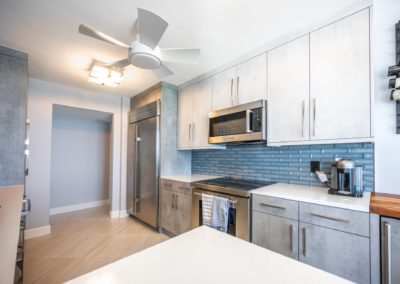 Kitchen with cement-look cabinets