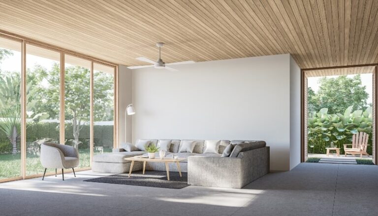 Modern contemporary loft living room with open door to garden