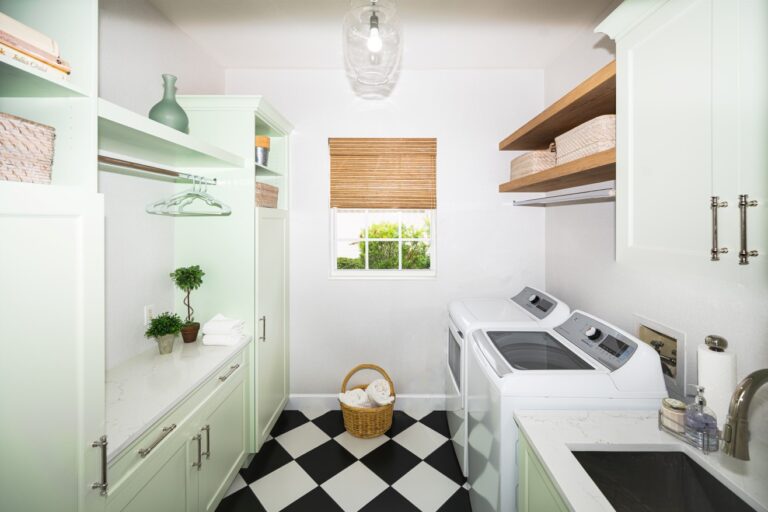 Retro laundry room with green cabinets