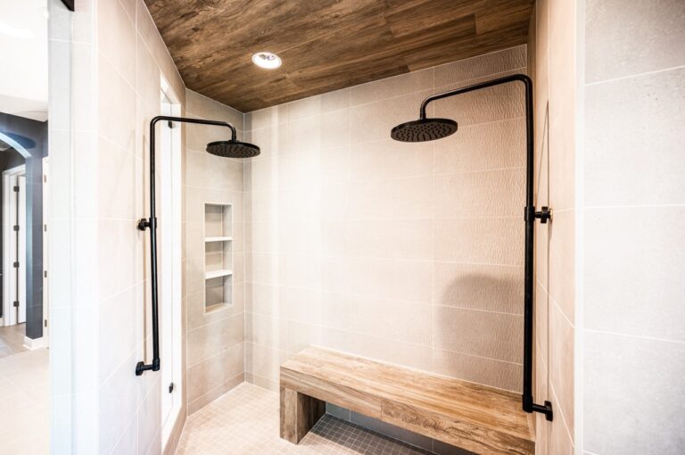 Shower with wood tile ceiling and two showerheads