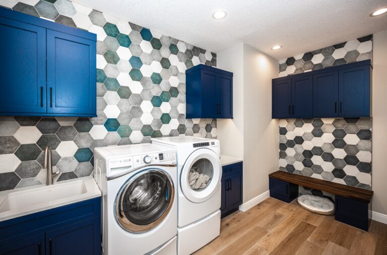 Blue hexagon tile on laundry room wall