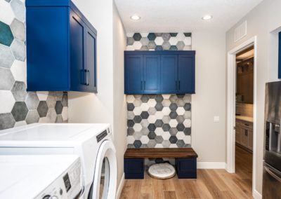 Blue cabinets in laundry room