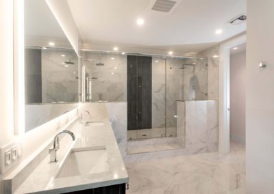 White shower with black strip down wall