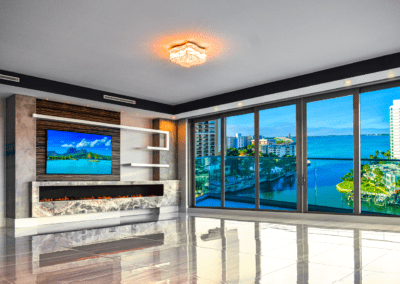 Open space with shelving above fireplace