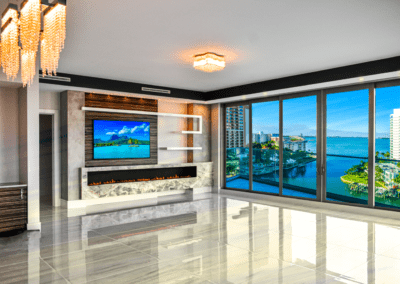 Open space with waterside view and fireplace surround