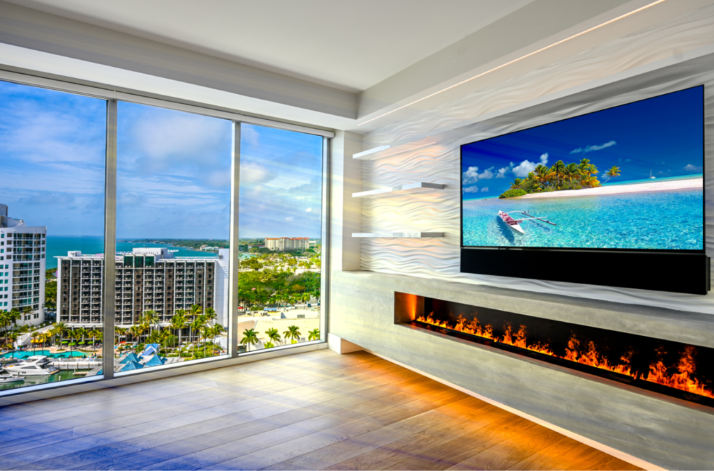 Concrete-look fireplace surround overlooking cityscape