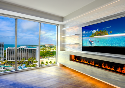 Concrete-look fireplace surround overlooking cityscape