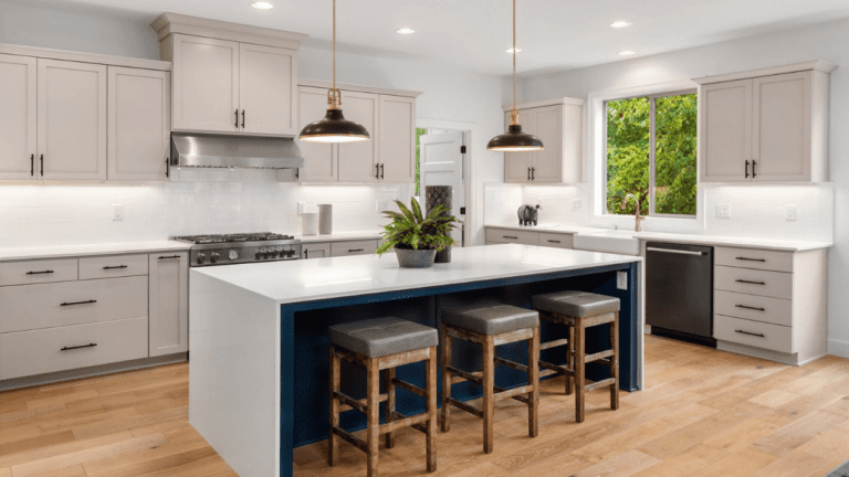 White kitchen island with stools