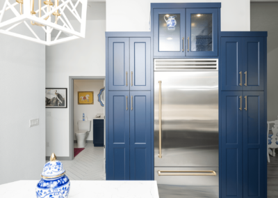 White kitchen with blue cabinets