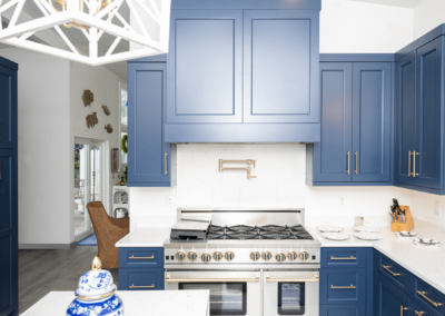 White kitchen with blue cabinets