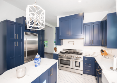 White kitchen with blue cabinets