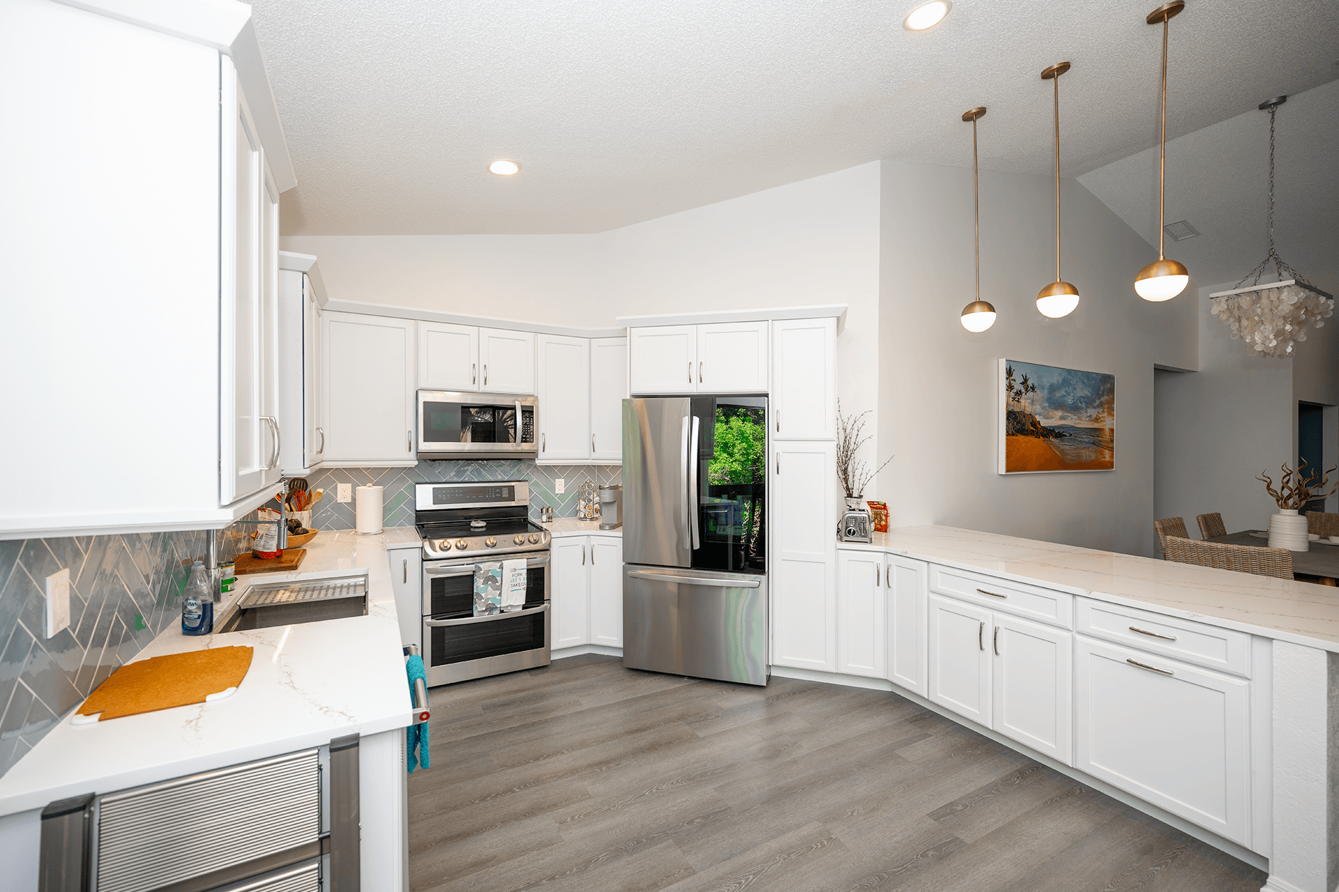 Gray cabinets and blue backsplash