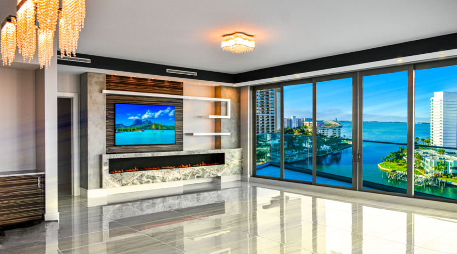 Open space with waterside view and fireplace surround
